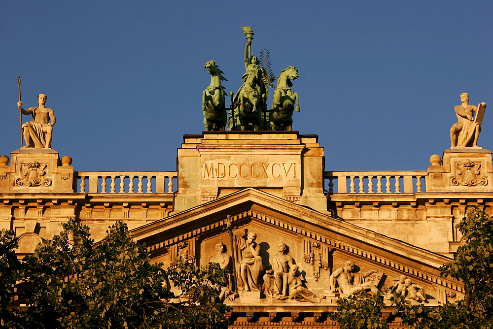 Roman goddess Justitia with three horses and a cart at the gable of the Ethnographical museum in Budapest, Hungary, Europe