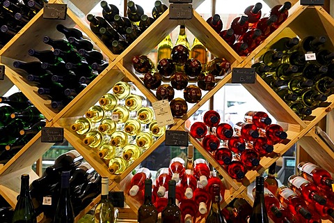 Shelf filled with wine bottles