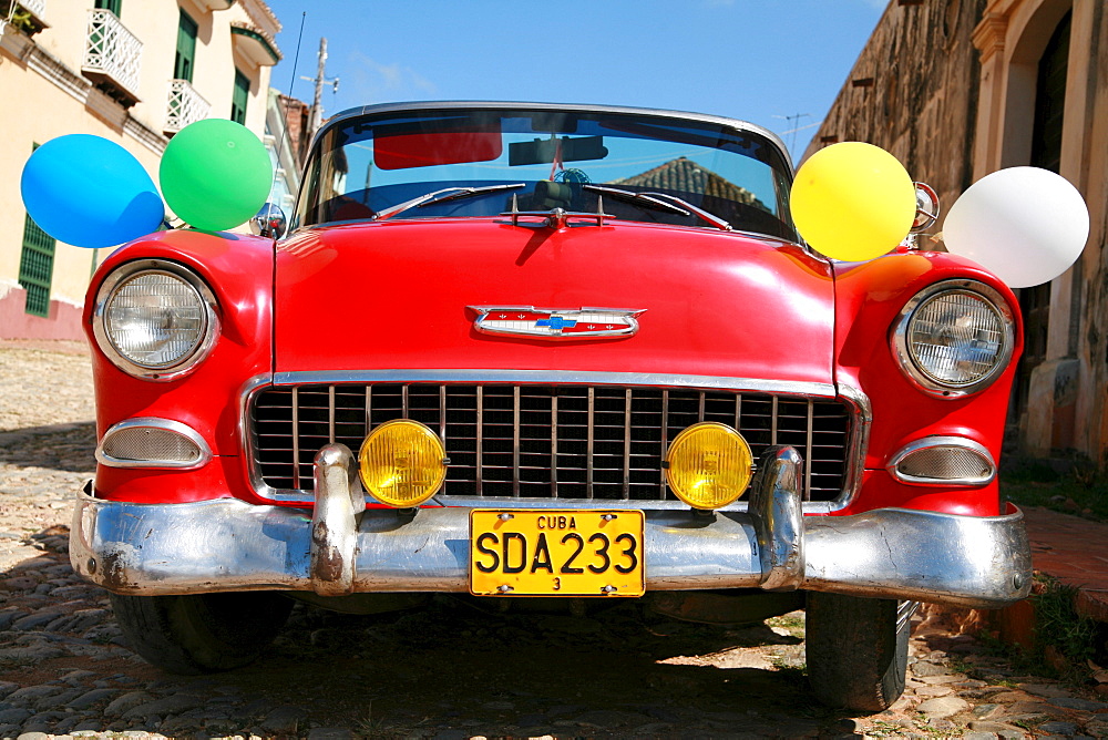 Vintage car decorated for a wedding in Trinidad, Sancti-Spiritus Province, Cuba, Latin America