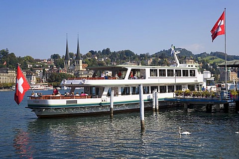 Ship and the cathedral of St. Leodegar, Lake Lucerne, Switzerland, Europe