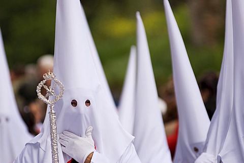 Penitents in white robes, Semana Santa procession, Granada, Andalusia, Spain