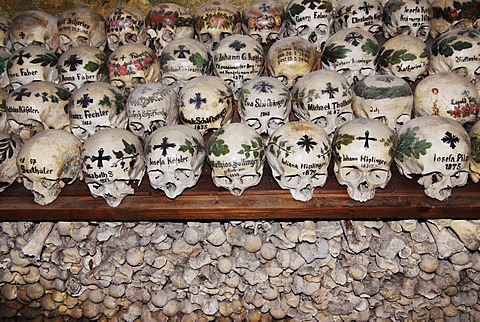 Painted skulls in the ossuary of Hallstatt, Salzkammergut, Upper Austria, Austria