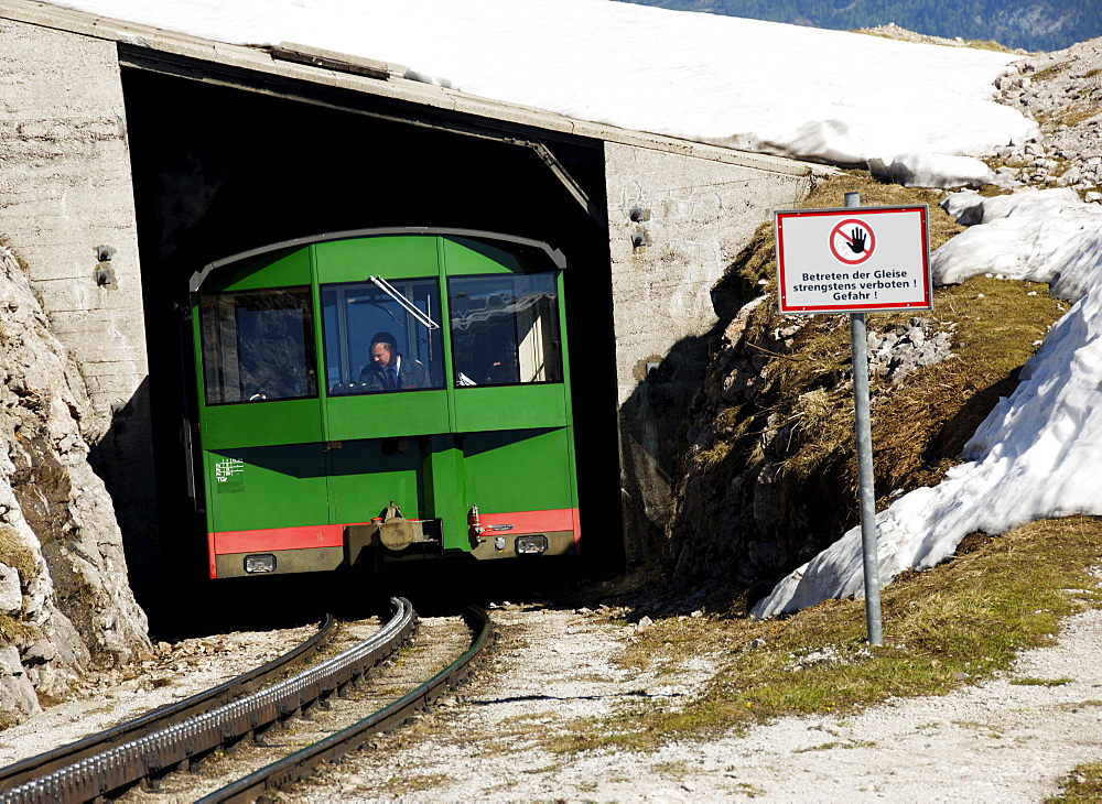 The Schafbergbahn, cog railway on the Schafberg Mountain coming out of a tunnel, Salzburg, Austria, Europe