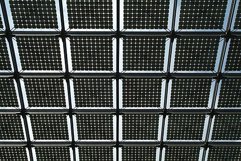 Glass roof of the station hall with solar cells in the new Berlin main station, Germany.