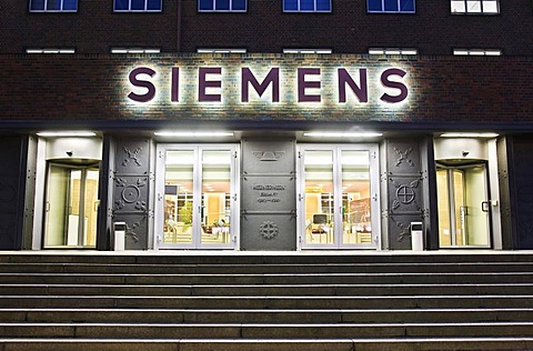 Wernerwerk multistrory building in the evening, entrance, sign, Siemens AG, Berlin, Germany.