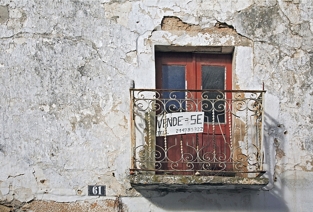 For Sale sign - "Se Vende" - in the spa town of Monchique, Algarve, Portugal