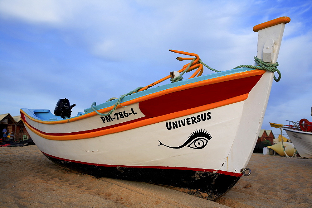 Fishing boat on the beach in Armacao de Pera, Algarve, Portugal