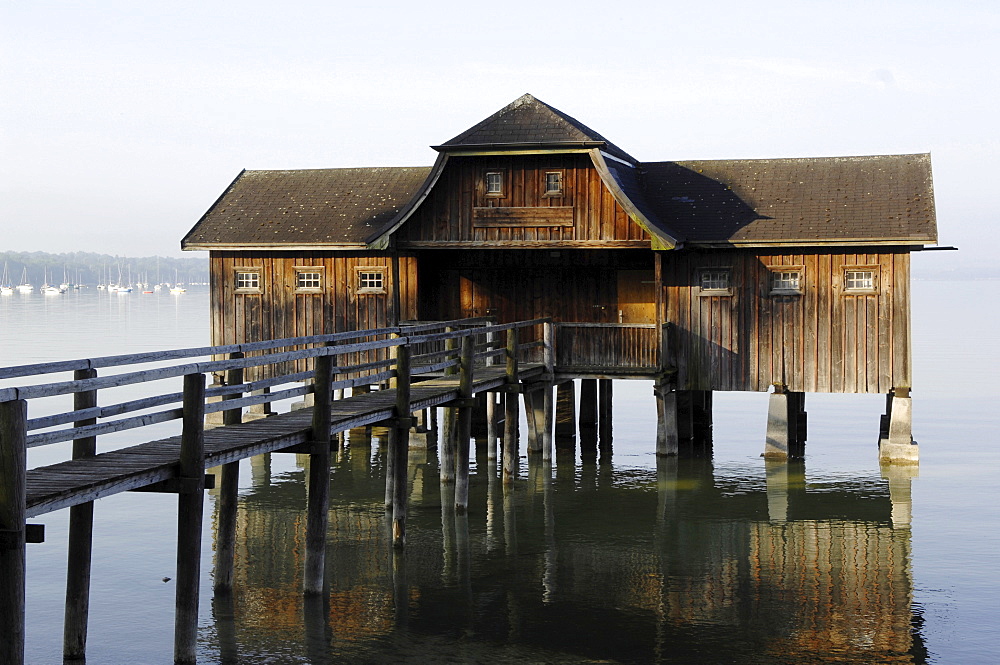 Building on stilts, wooden house, Stegen, Lake Ammersee, Upper Bavaria, Germany, Europe