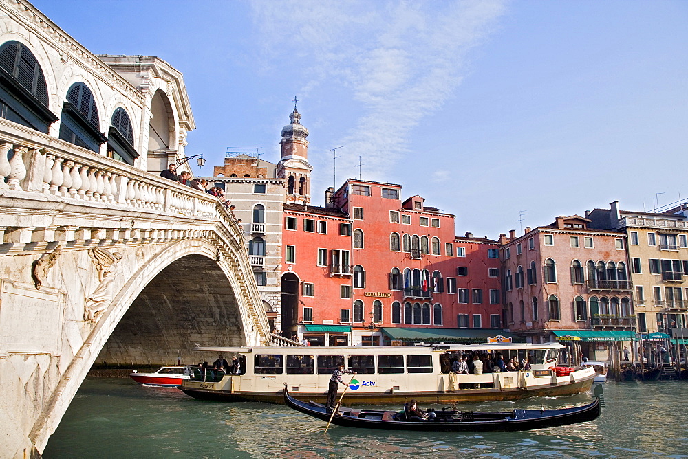 Gondola and Vaporetto on the Grande Canal under the Rialto Bridge, Venice, Veneto, Italy, Europe