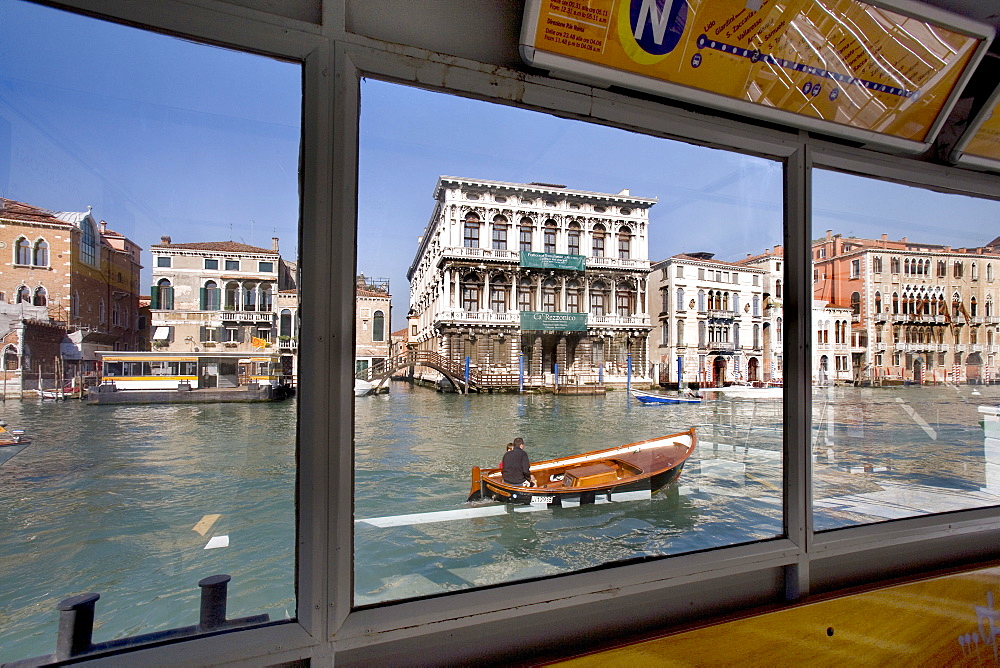 View through the ferry station in front of Palazzo Ca' Rezzonico, Canal Grande, Venezia, Venice, Italy, Europe