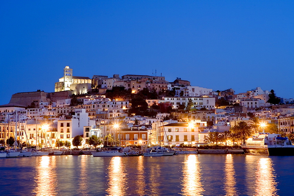 View over the harbour of the illuminated historic centre of Dalt Vila, Ibiza, Balearic Islands, Spain, Europe