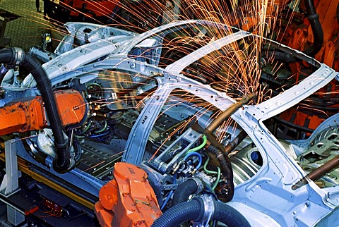 Industry robot robotics spot welding car production at BMW in Munich Bavaria Germany