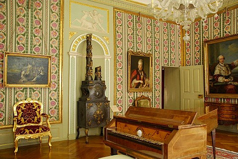 Rococo room containing a harpsichord and a wood-burning stove, in the Kurpfaelzischen Museum, Heidelberg, Baden-Wuerttemberg, Germany, Europe