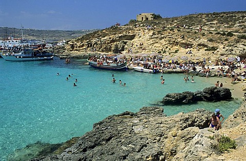 Tourists at Blue Lagoon, Comino island, Malta