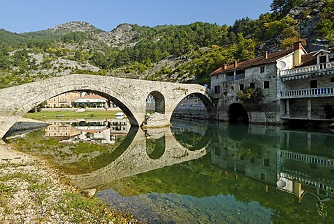 Historic stone bridge in Rijeka Crnojevica at Skutari lake, Montenegro