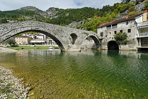 Historic stone bridge in Rijeka Crnojevica at Skutari lake, Montenegro