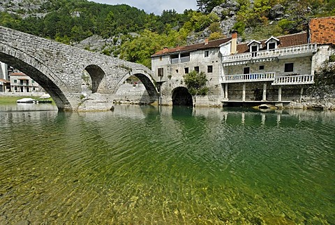 Historic stone bridge in Rijeka Crnojevica at Skutari lake, Montenegro