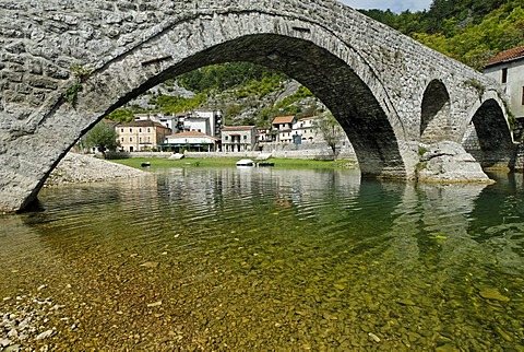 Historic stone bridge in Rijeka Crnojevica at Skutari lake, Montenegro