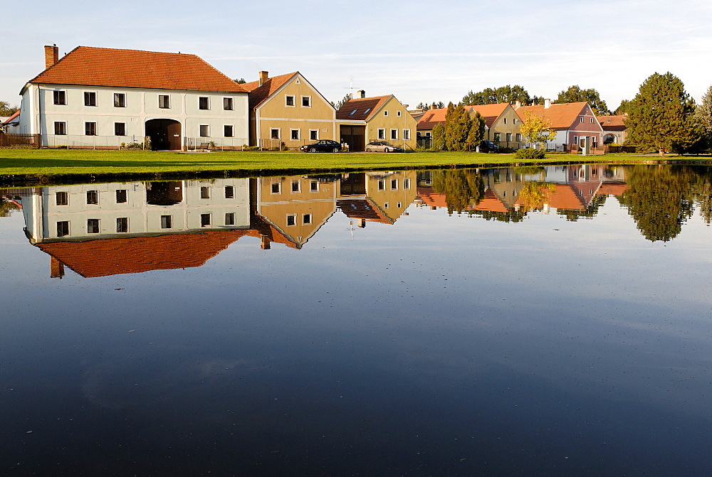 Village square with fire pond of Zabori, south Bohemia, Czech Republic