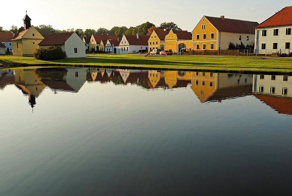 Village square with fire pond of Zabori, south Bohemia, Czech Republic