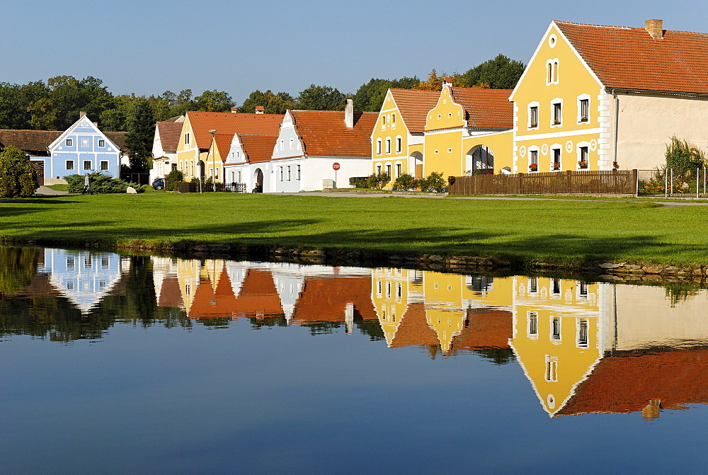 Village square with fire pond of Zabori, south Bohemia, Czech Republic