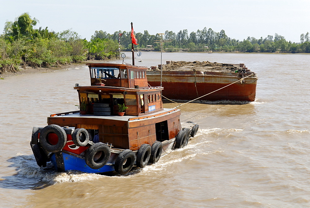 Ships and boats on the Mekong river, Vietnam