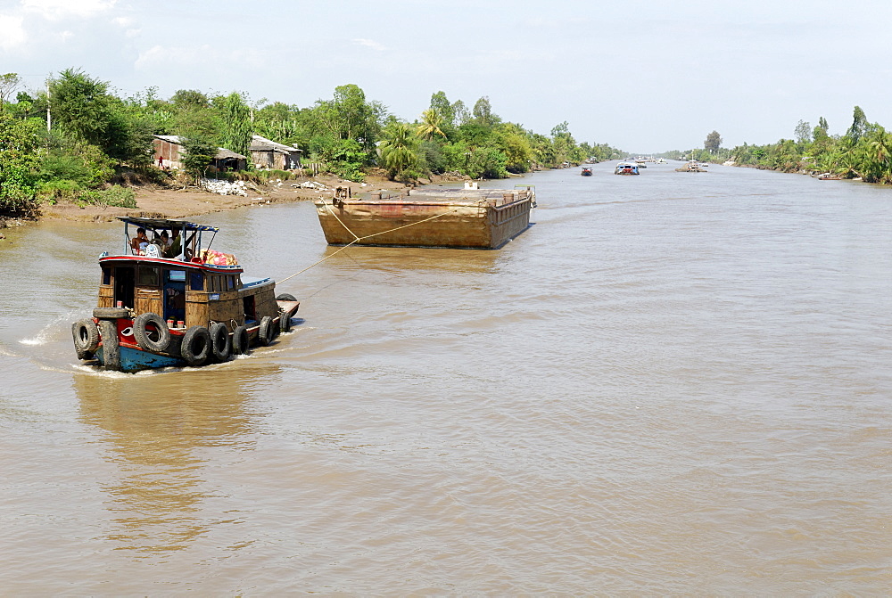 Ships and boats on the Mekong river, Vietnam