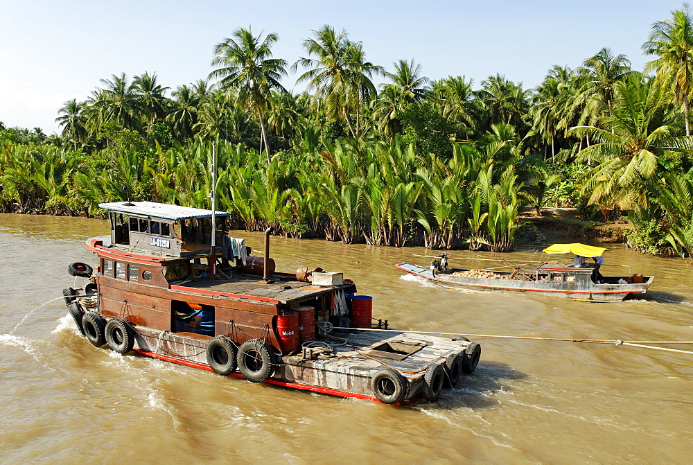 Ships and boats on the Mekong river, Vietnam