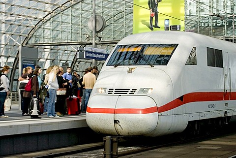 Travellers on the platform at the central station, Berlin, Germany