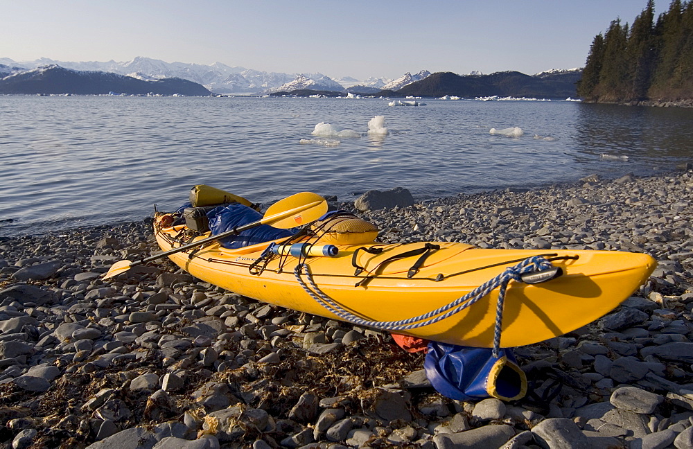 Sea kayak on the shore, paddle, Glacier Island, Columbia Glacier behind, Pacific Coast, Chugach National Forest, Prince William Sound, Alaska, USA