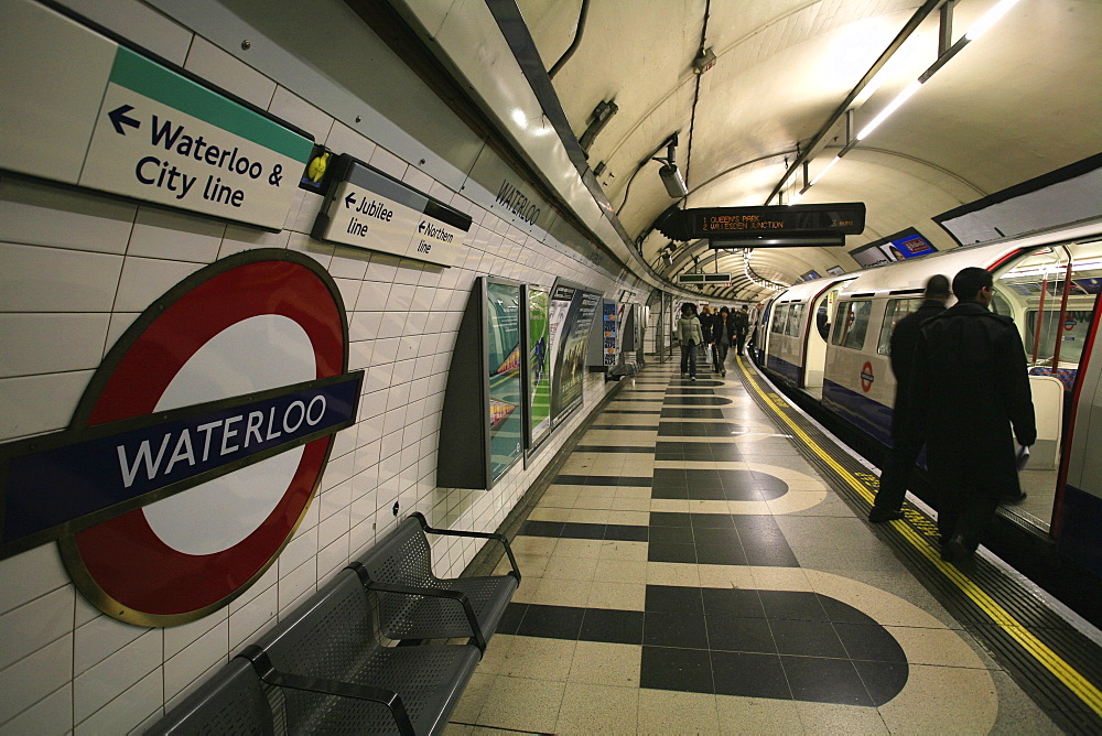 Inside Waterloo tube station, signs pointing the way to the Waterloo and City Lines, London, England, UK