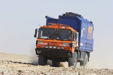 MAN rallye truck on dusty road