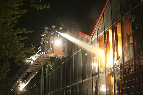 Firefighter put out the fire in an gardenmarket in Treis-Karden, Rhineland-Palatinate Germany