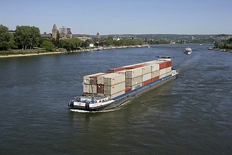 Containership on the river rhine in front of castle Ehrenbreitstein. Koblenz, Rhineland-Palatinate, Germany.