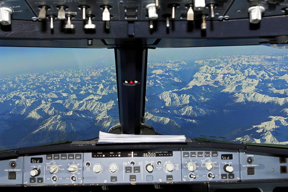 View from the cockpit of an Airbus 321, in flight over the Alps