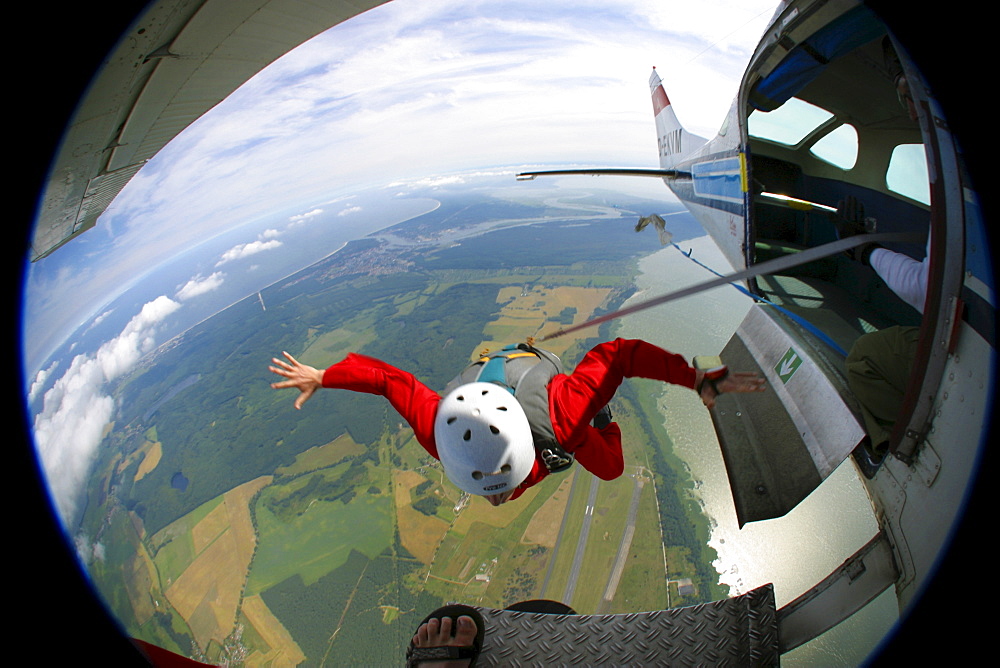 Parachutist leaving the aircraft