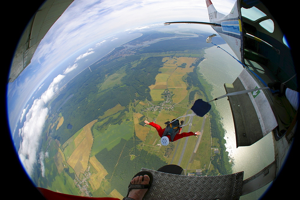 Parachutist leaving the aircraft