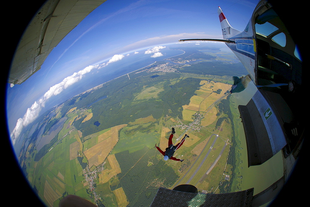 Parachutist leaving the aircraft