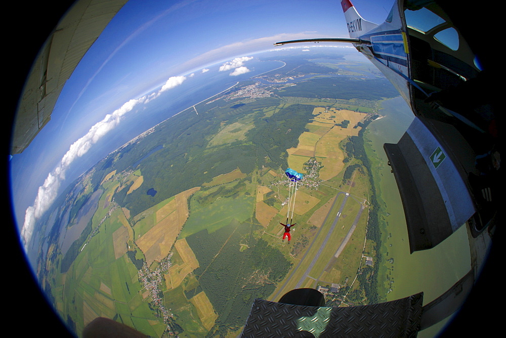 Parachutist leaving the aircraft