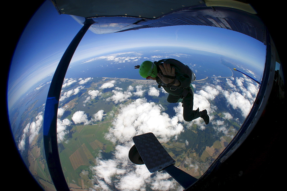 Parachutist leaving the aircraft