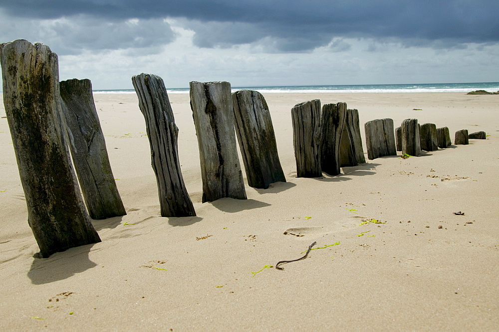 Wave breaker at the beach, Bretagne, France