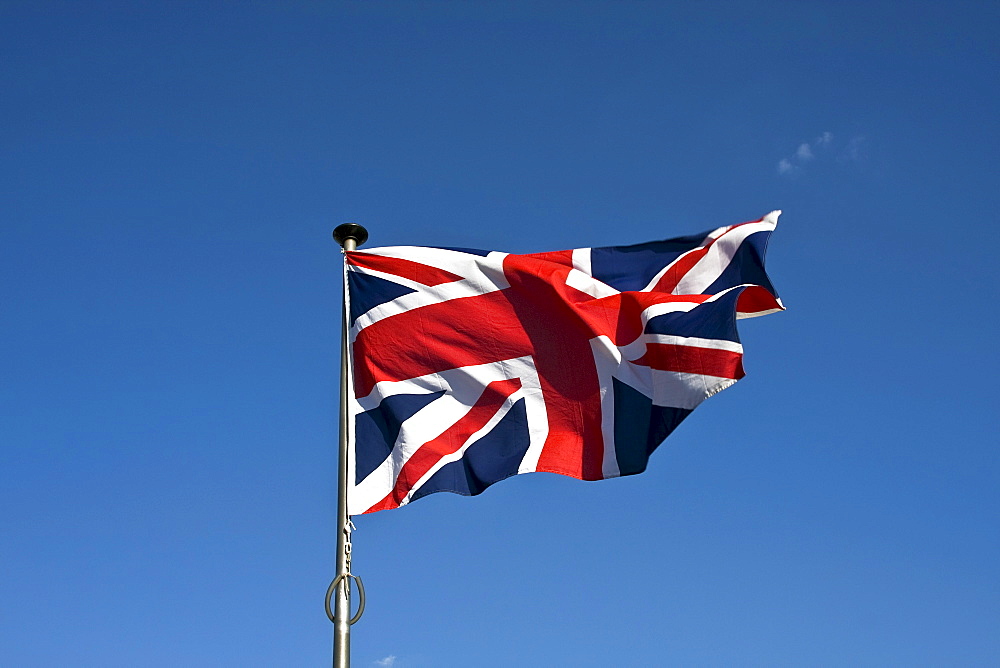 Union Jack, English Flag, Flag of Great Britain, fluttering in the wind on a flagpole