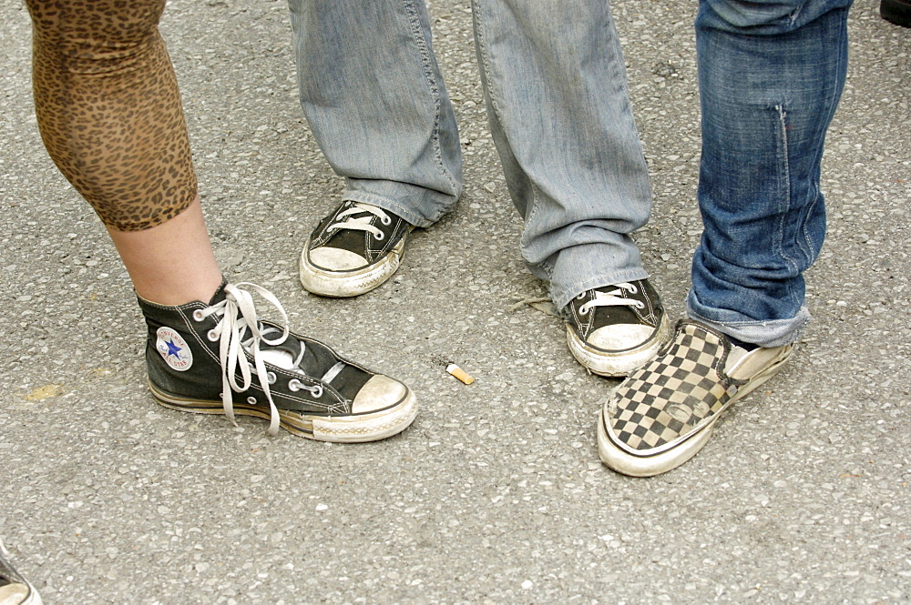 Punks with different sports shoes.