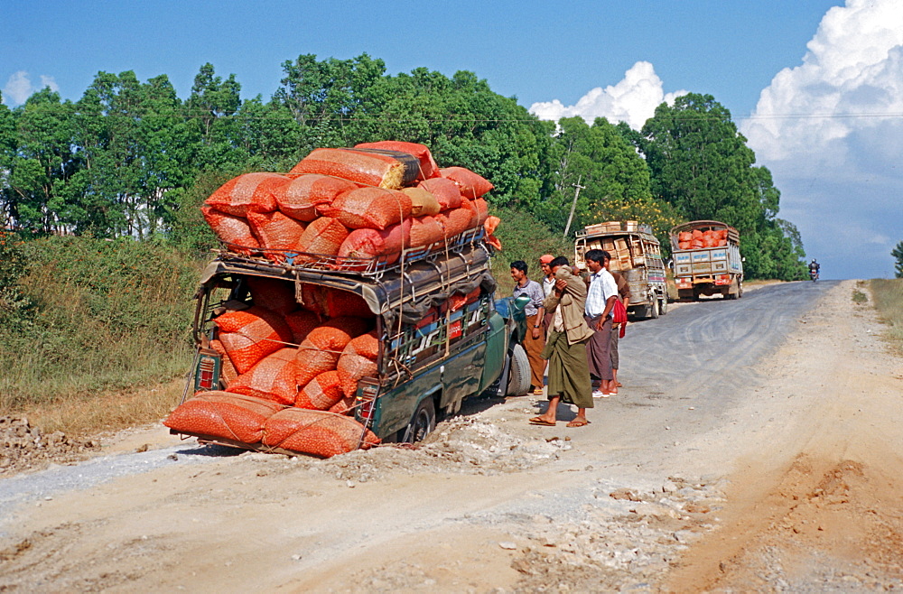 Cramped pickup with broken axle, Burma, Asia