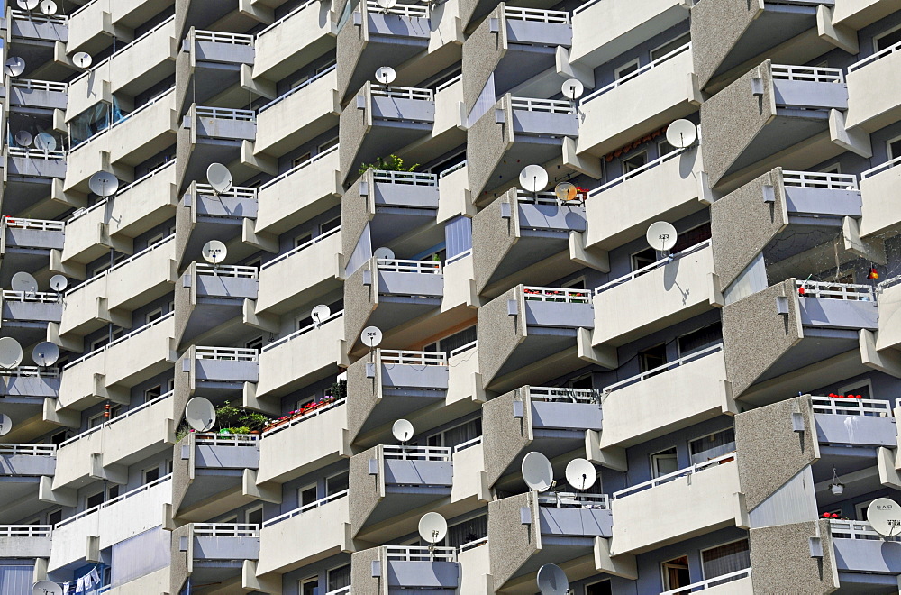 Residential building with balconies and satellite dishes, Chorweiler near Cologne, North Rhine-Westphalia, Germany, Europe