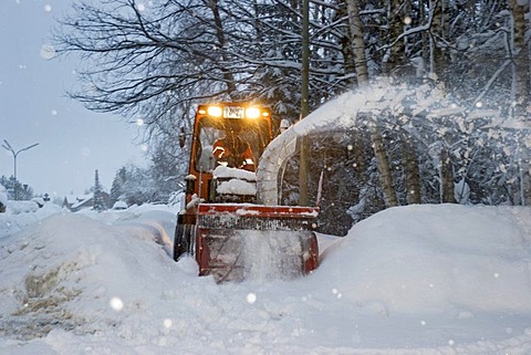 Snow blower at driving snow Bavaria Germany