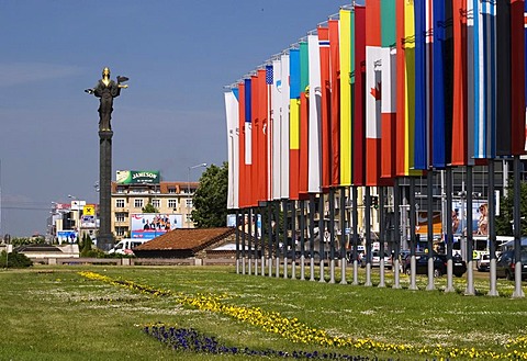 Sofia statue and Nato flags in front of government building, city center, Sofia, Bulgaria