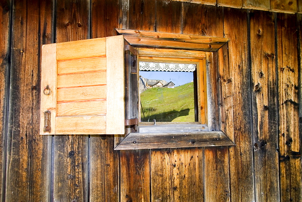 Cabin detail, window reflection, Dolomites, Italy, Europe