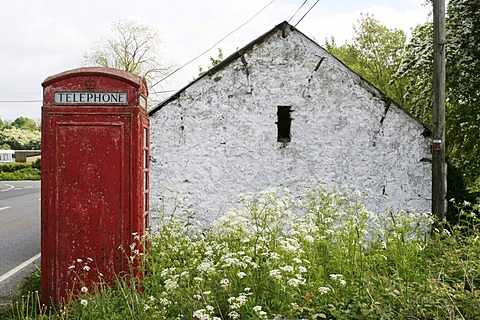 Stone house and red phone booth, Monaghan county, Ireland, Eire