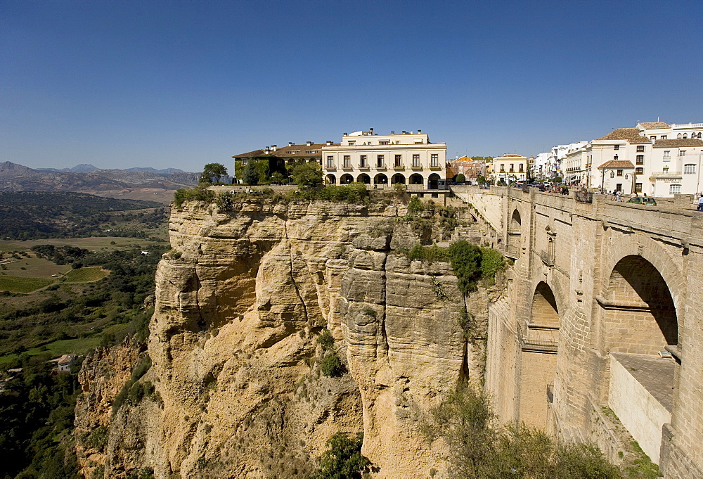 Parador Hotel, Parador De Ronda, in the historic city centre on a rock plateau in the Serrania de Ronda, at the front a bridge over the River Tajo, Ronda, Andalusia, Spain, Europe